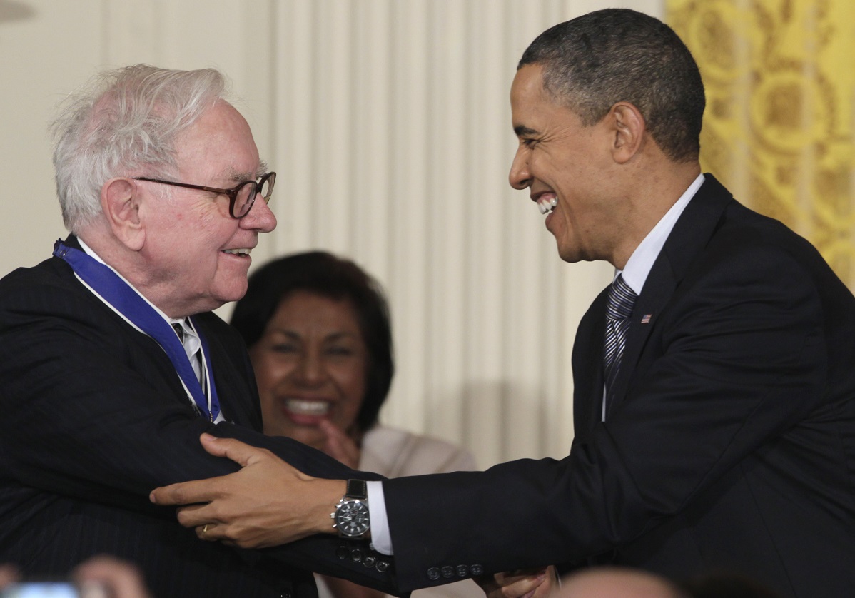 President Barack Obama shakes hands with Warren Buffett after presenting him with a 2010 Presidential Medal of Freedom, Tuesday, Feb. 15, 2011, during a ceremony in the East Room of the White House in Washington. (AP Photo/Carolyn Kaster)