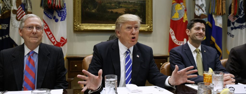 President Donald Trump, flanked by Senate Majority Leader Mitch McConnell of Ky., left, and House Speaker Paul Ryan of Wis., speaks during a meeting with House and Senate leadership, Wednesday, March 1, 2017, in the Roosevelt Room of the White House in Washington. (AP Photo/Evan Vucci)