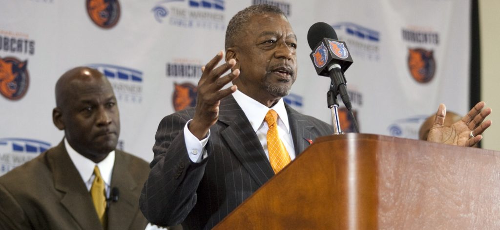 Michael Jordan, left, listens during a news conference Thursday, March 18, 2010 in Charlotte, N.C., as former Charlotte Bobcats majority owner Robert L. Johnson speaks. Jordan told reporters and season ticket holders it's a "dream come true" to own the Bobcats. On Wednesday, rest of the NBA's owners approved his $275 million purchase from Bob Johnson. Jordan is the first former player to own an NBA team, and the second black majority owner. Johnson was the first. (AP Photo/Jason E. Miczek)