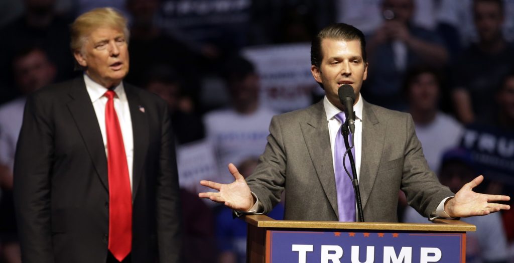 Donald Trump, Jr. speaks as Republican presidential candidate Donald Trump listens during a campaign stop Wednesday, April 27, 2016, in Indianapolis. (AP Photo/Darron Cummings)