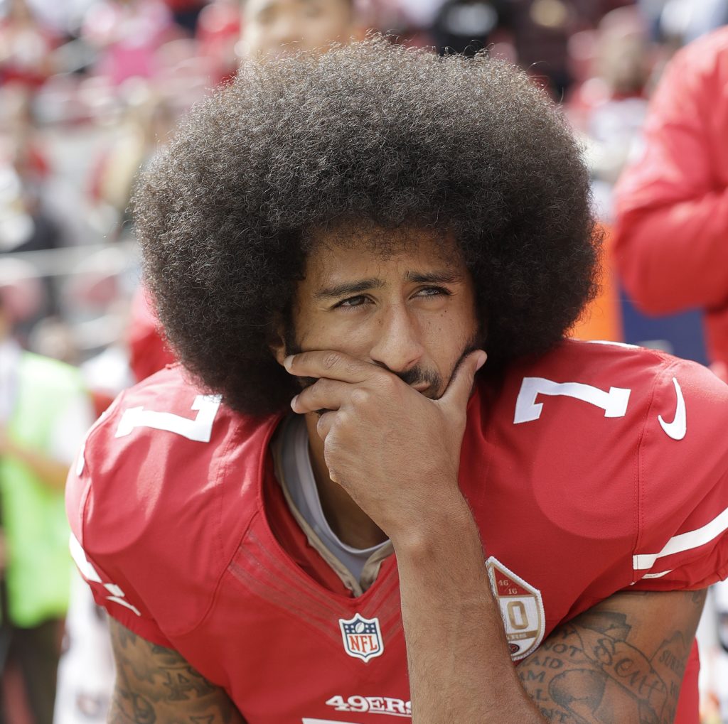 San Francisco 49ers quarterback Colin Kaepernick kneels during the national anthem before an NFL football game against the Dallas Cowboys in Santa Clara, Calif., Sunday, Oct. 2, 2016. (AP Photo/Marcio Jose Sanchez)