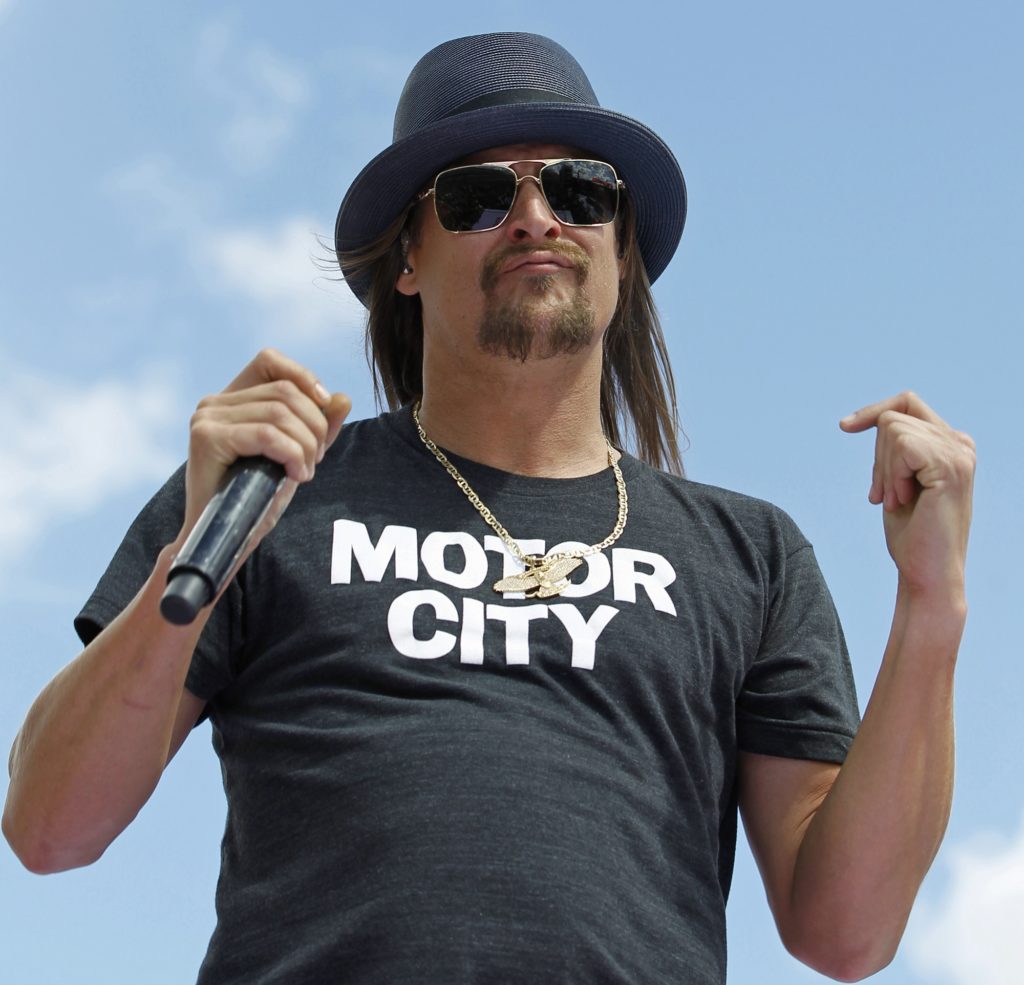 FILE - In this Feb. 22, 2015 file photo, Kid Rock performs before the Daytona 500 NASCAR Sprint Cup series auto race at Daytona International Speedway in Daytona Beach, Fla. A civil rights organization said Wednesday, Sept. 6, 2017, they are demanding the cancellation of concerts by Kid Rock at a new sports arena in Detroit, saying his criticism of NFL quarterback Colin Kaepernick was a "dog whistle" to white supremacist groups. (AP Photo/Terry Renna, File)