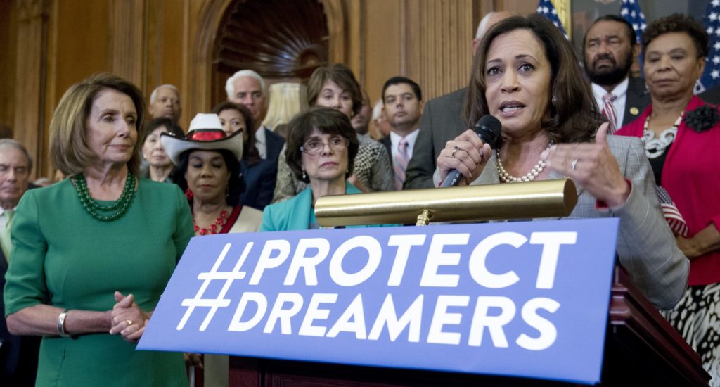 Sen. Kamala Harris, D-Calif., accompanied by House Minority Leader Nancy Pelosi of Calif., left, and others members of the House and Senate Democrats, speaks during a news conference on Capitol Hill in Washington, Wednesday, Sept. 6, 2017. House and Senate Democrats gather to call for Congressional Republicans to stand up to President Trump's decision to terminate the Deferred Action for Childhood Arrivals (DACA) initiative by bringing the DREAM Act for a vote on the House and Senate Floor. ( AP Photo/Jose Luis Magana)