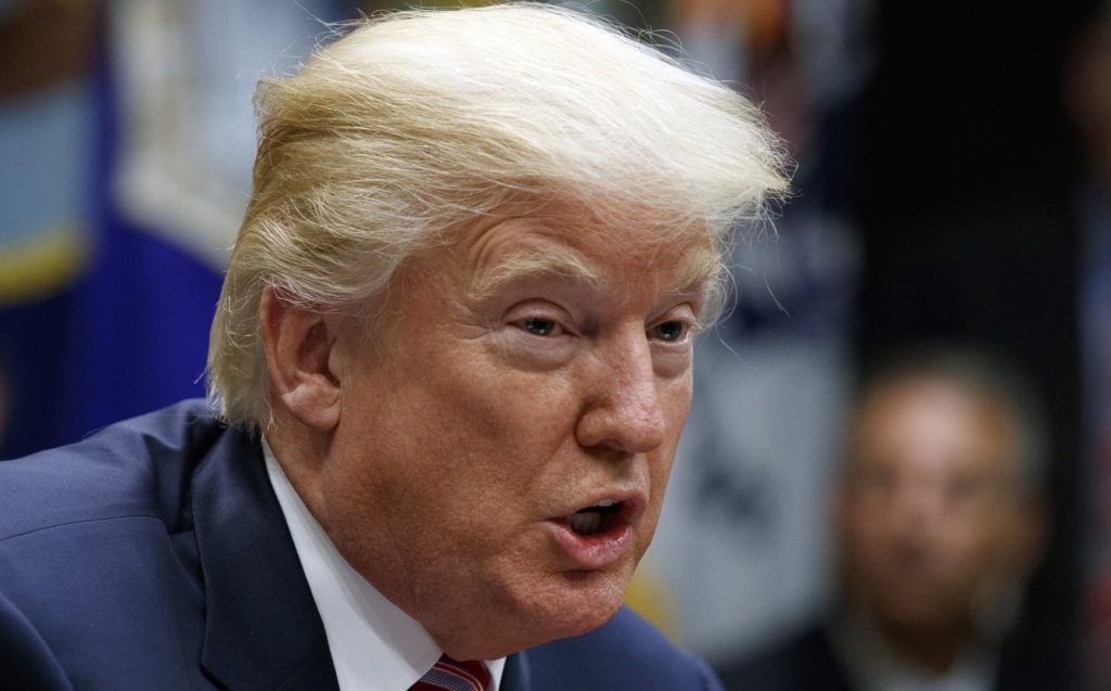 In this Tuesday, Oct. 31, 2017 photo, President Donald Trump speaks during a meeting in the Roosevelt Room of the White House in Washington. Trump is calling for “Merit Based immigration” following the truck attack in New York City that killed eight people and injured 11. Trump says on Twitter Wednesday that the driver in Tuesday’s attack “came into our country through what is called the ‘Diversity Visa Lottery Program,’ a Chuck Schumer beauty.” (AP Photo/Evan Vucci)