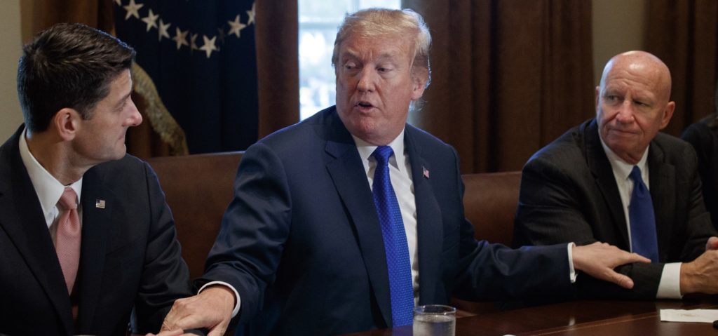 President Donald Trump speaks during a meeting on tax policy with Republican lawmakers in the Cabinet Room of the White House, Thursday, Nov. 2, 2017, in Washington, with House Speaker Paul Ryan of Wis., and Chairman of the House Ways and Means Committee Rep. Kevin Brady, R-Texas, right. (AP Photo/Evan Vucci)