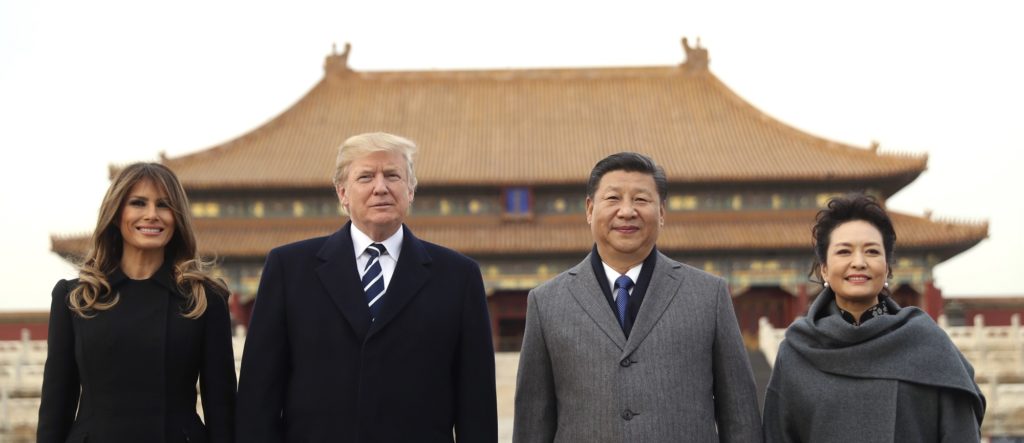 President Donald Trump, second left, first lady Melania Trump, left, Chinese President Xi Jinping, second right, and his wife Peng Liyuan, right, stand together as they tour the Forbidden City, Wednesday, Nov. 8, 2017, in Beijing, China. Trump is on a five country trip through Asia traveling to Japan, South Korea, China, Vietnam and the Philippines. (AP Photo/Andrew Harnik)