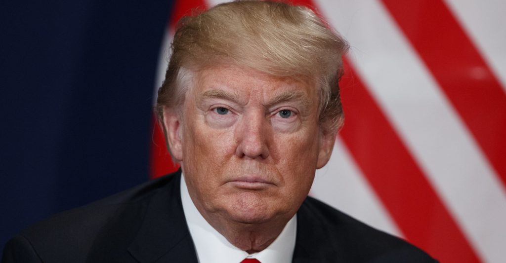 President Donald Trump listens during a meeting with Swiss President Alain Berset at the World Economic Forum, Friday, Jan. 26, 2018, in Davos. (AP Photo/Evan Vucci)