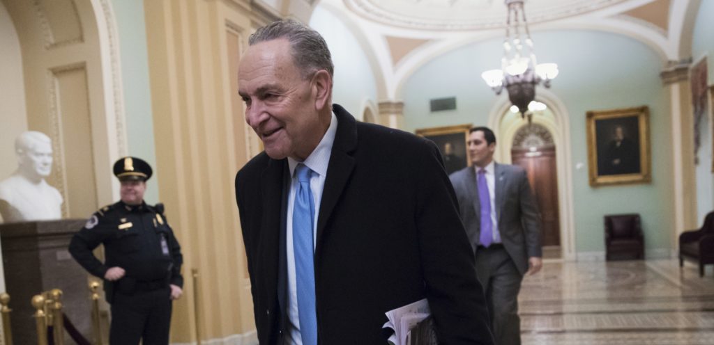 Senate Minority Leader Chuck Schumer, D-N.Y., arrives at the Capitol at the start of the third day of the government shutdown, in Washington, Monday, Jan. 22, 2018. Schumer, arguably the most powerful Democrat in Washington, is trying to keep his party together to force a spending bill that would include protections for young immigrants. (AP Photo/J. Scott Applewhite)