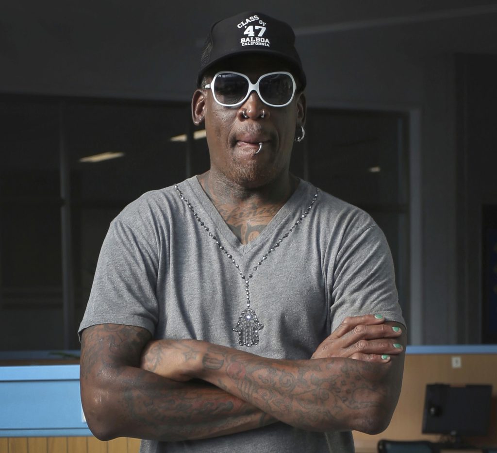 FILE - In this June 14, 2017, file photo former NBA basketball star Dennis Rodman listens to a guide at the Sci-Tech Complex in Pyongyang, North Korea. Police say Rodman has been arrested on suspicion of DUI in Southern California. Lt. Rachel Johnson of the Newport Beach Police Department says Rodman was pulled over late Saturday, Jan. 13, 2018, for a traffic violation. Johnson says officers administered a field sobriety test, which Rodman failed. Rodman was released from custody Sunday morning. (AP Photo/Kim Kwang Hyon, File)