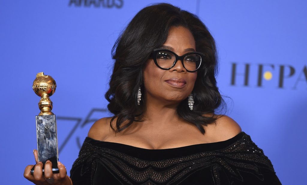 Oprah Winfrey poses in the press room with the Cecil B. DeMille Award at the 75th annual Golden Globe Awards at the Beverly Hilton Hotel on Sunday, Jan. 7, 2018, in Beverly Hills, Calif. (Photo by Jordan Strauss/Invision/AP)