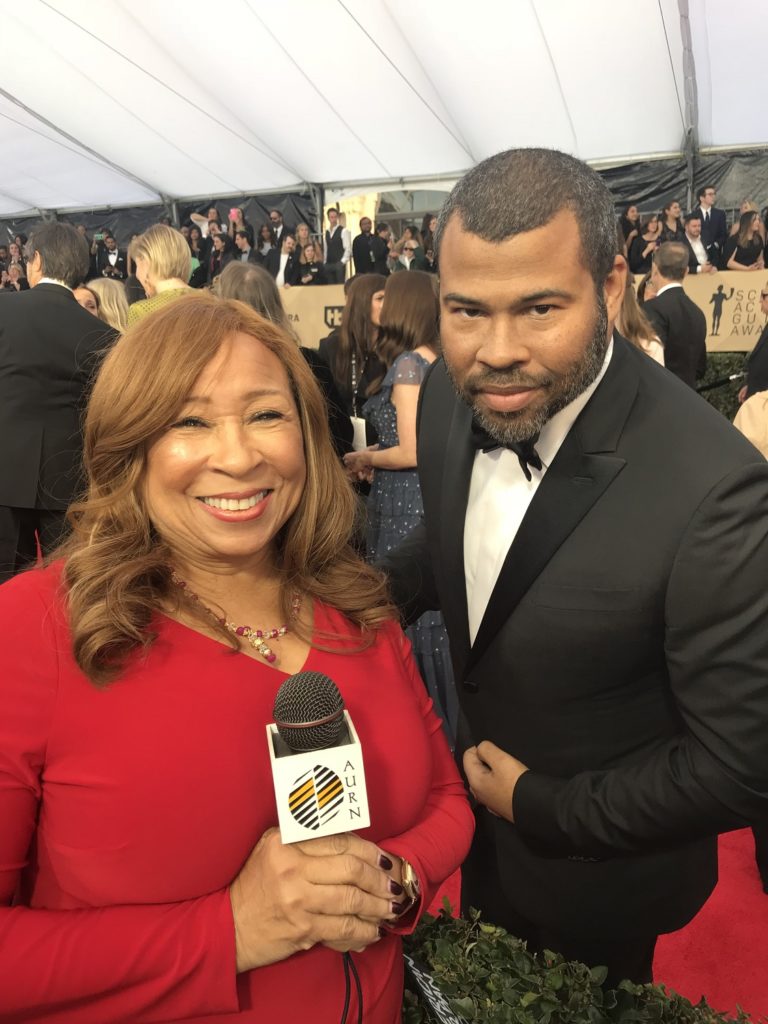 Tanya Hart shares a moment with Jordan Peele on the SAG Awards red carpet.