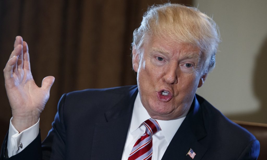 President Donald Trump speaks during a meeting with lawmakers about trade policy in the Cabinet Room of the White House, Tuesday, Feb. 13, 2018, in Washington. (AP Photo/Evan Vucci)