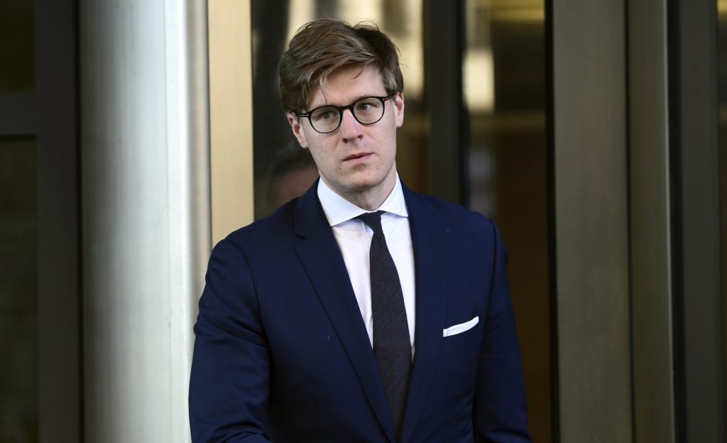 Alex van der Zwaan leaves Federal District Court in Washington, Tuesday, Feb. 20, 2018. Alex van der Zwaan, who worked at the law firm Skadden, Arps, Slate, Meagher & Flom until he was fired last year formally pleaded guilty to a single charge of making false statements. He admitted Tuesday he lied to federal investigators working for special counsel Robert Mueller. (AP Photo/Susan Walsh)