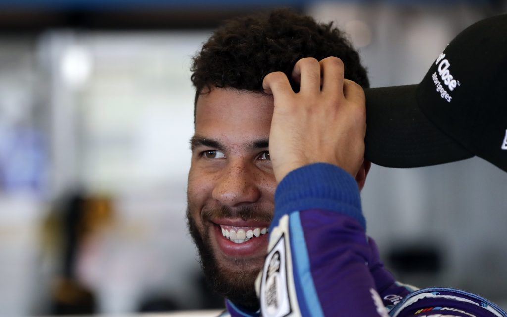 Darrell Wallace Jr. relaxes in his garage during practice for the NASCAR Daytona 500 auto race at Daytona International Speedway, Saturday, Feb. 17, 2018, in Daytona Beach, Fla. (AP Photo/John Raoux)