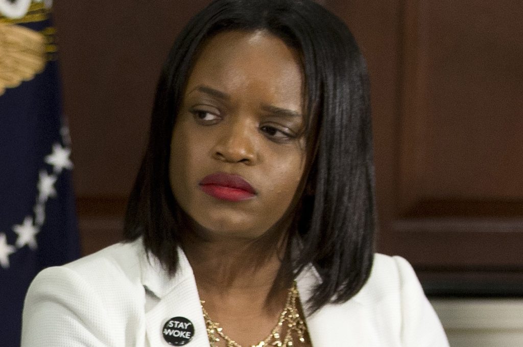 FILE – In this July 13, 2016 file photo, Brittany Packnett, of the President's Task Force on 21st Century Policing, participates in a meeting about community policing and criminal justice with President Barack Obama and activists, civil rights, faith, law enforcement and elected leaders at the Eisenhower Executive Office Building on the White House complex in Washington. A pair of testy exchanges between high-profile black women and white men in the political spotlight Tuesday, March 28, 2017, launched a tweetstorm under the hashtag BlackWomenAtWork. (AP Photo/Carolyn Kaster, File)