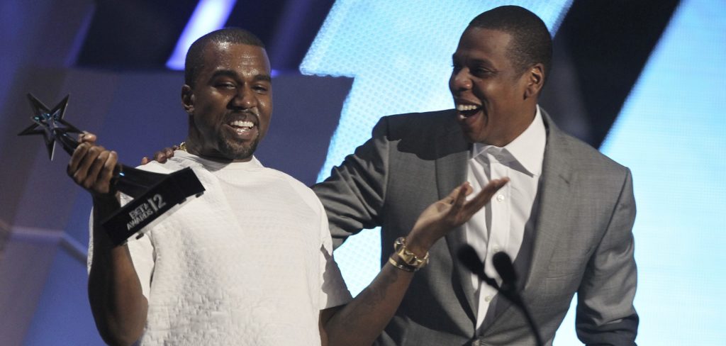 FILE - In this July 1, 2012, file photo, Kanye West, left, and Jay-Z accept the award for best group for "The Throne" at the BET Awards in Los Angeles. West told the crowd during his show in Seattle on Oct. 19, 2016, that his kids haven't played with Jay Z's daughter. (Photo by Matt Sayles/Invision/AP, File)