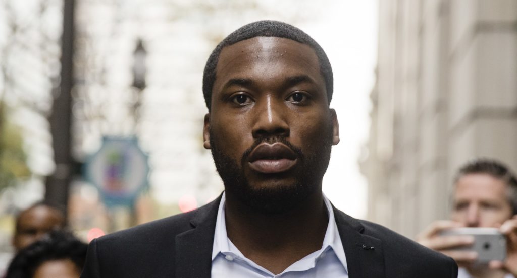 FILE - In this Nov. 6, 2017 file photo rapper Meek Mill arrives at the criminal justice center in Philadelphia. A Philadelphia judge has sentenced rapper Mill to two to four years in state prison for violating probation in a nearly decade-old gun and drug case. Mill’s imprisonment on a probation violation has set off a flurry of legal appeals, criticism of the criminal justice system, newspaper opinion pieces, rallies, billboards and bus ads. (AP Photo/Matt Rourke, File)