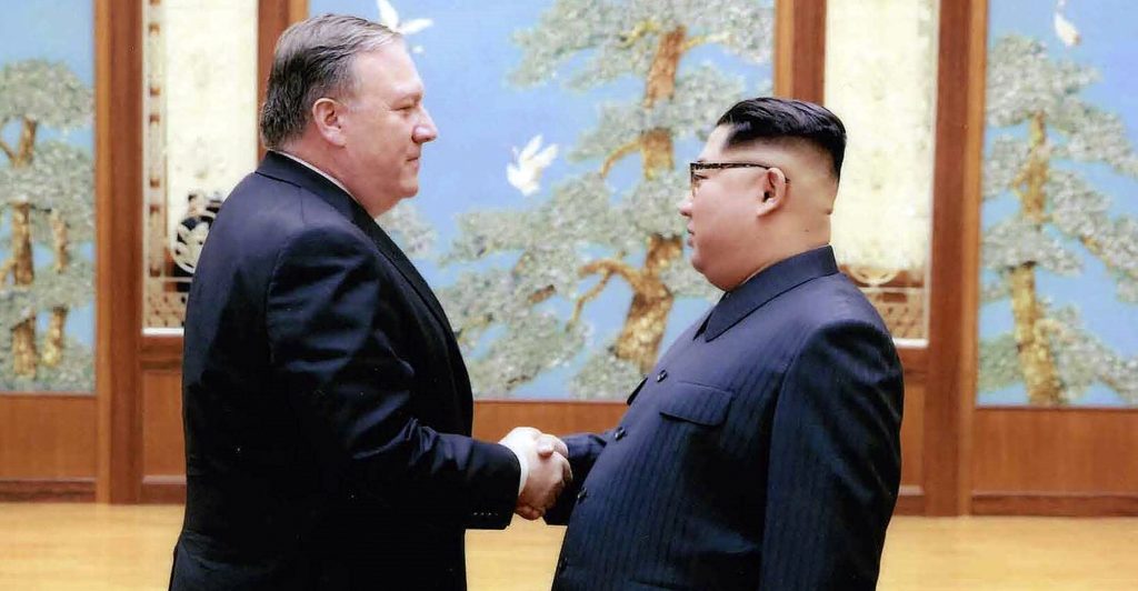 In this image released by the White House, then-CIA director Mike Pompeo shakes hands with North Korean leader Kim Jong Un in Pyongyang, North Korea, during a 2018 East weekend trip. President Donald Trump revealed more information about Pompeo's secret trip to North Korea, saying Pompeo wasn't supposed to meet with Kim, but that they ended up talking for more than an hour. Pompeo, who won Senate confirmation April 26, to become secretary of state, was the most senior U.S. official to meet a North Korean leader since 2000. (White House via AP)