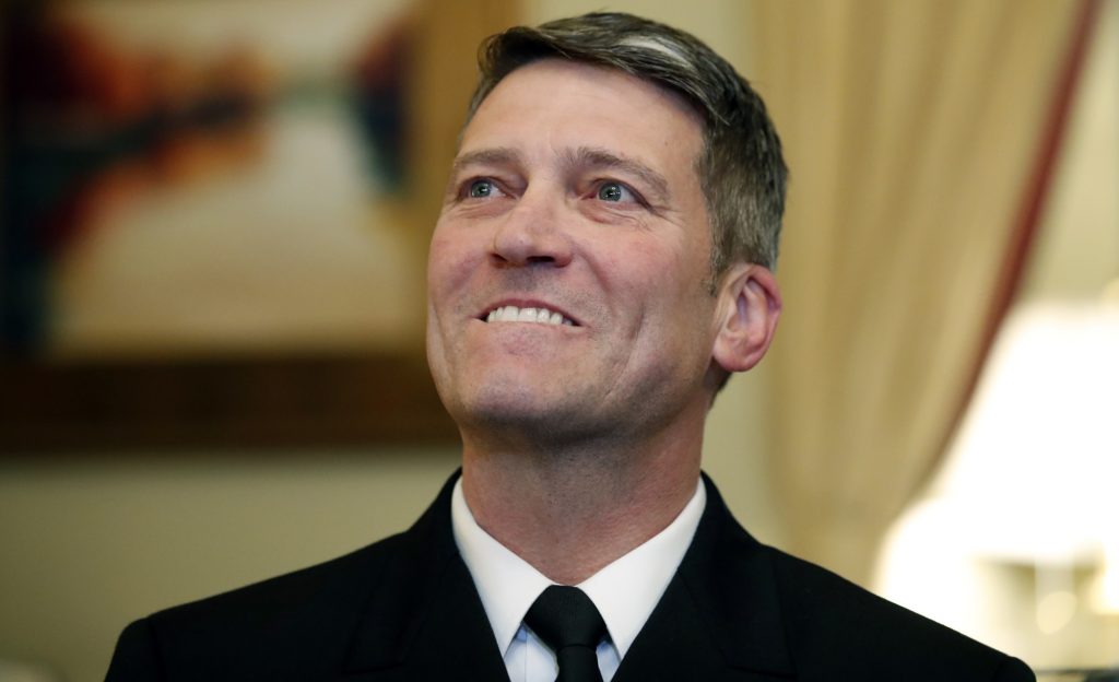 U.S. Navy Rear Admiral Ronny Jackson, M.D., sits with Sen. Johnny Isakson, R-Ga., chairman of the Veteran's Affairs Committee, before their meeting on Capitol Hill, Monday, April 16, 2018 in Washington. Jackson is President Donald Trump's nominee to be the next Secretary of Veterans Affairs. (AP Photo/Alex Brandon)