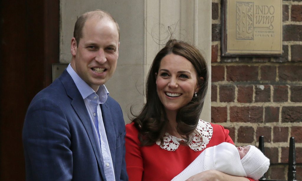 Britain's Prince William and Kate, Duchess of Cambridge smile as they hold their newborn baby son as they leave the Lindo wing at St Mary's Hospital in London London, Monday, April 23, 2018. The Duchess of Cambridge gave birth Monday to a healthy baby boy — a third child for Kate and Prince William and fifth in line to the British throne. (AP Photo/Tim Ireland)