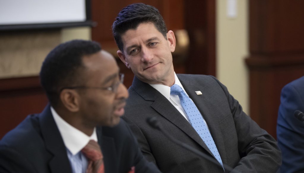 Speaker of the House Paul Ryan, R-Wis., who announced yesterday he will not run for re-election, listens to Elroy Sailor, an executive focused on GOP outreach to the African American community, as he attends a Communities of Color breakfast meeting at the Capitol in Washington, Thursday, April 12, 2018. (AP Photo/J. Scott Applewhite)
