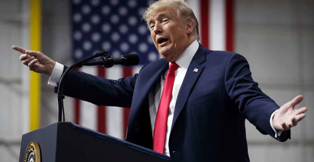 In this March 10, 2018, photo, President Donald Trump speaks at a campaign rally at Atlantic Aviation in Moon Township, Pa. Weeks after prodding lawmakers to stand up to the National Rifle Association,Trump is backing off his call for increasing the minimum age to buy an assault weapon — an idea strongly opposed by the NRA. (AP Photo/Carolyn Kaster)