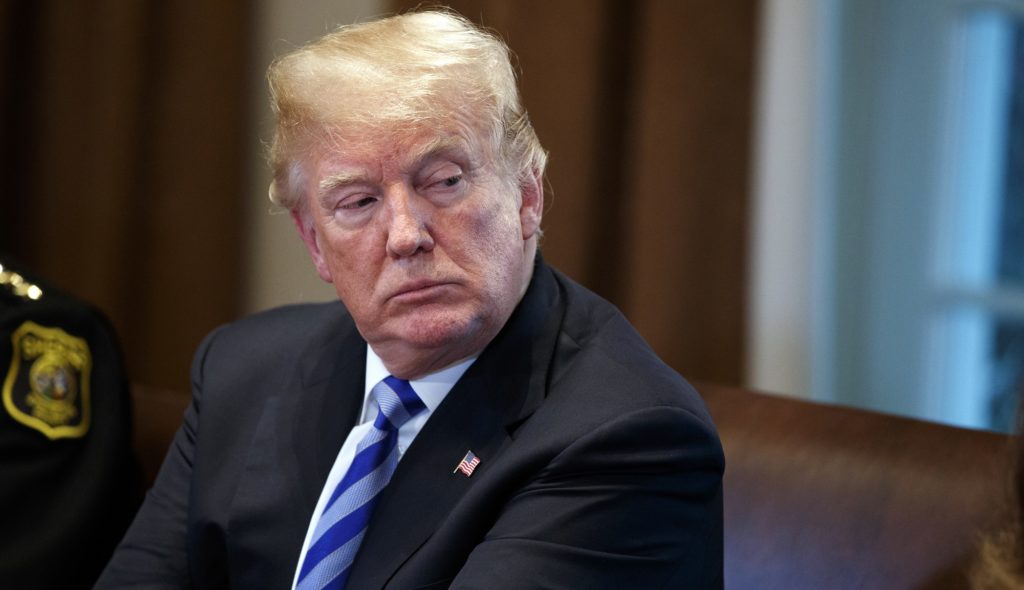 President Donald Trump listens during a roundtable on immigration policy in California, in the Cabinet Room of the White House, Wednesday, May 16, 2018, in Washington. (AP Photo/Evan Vucci)