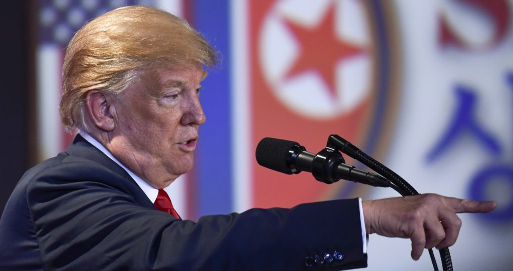 U.S. President Donald Trump answers questions about the summit with North Korea leader Kim Jong Un during a press conference at the Capella resort on Sentosa Island Tuesday, June 12, 2018 in Singapore. (AP Photo/Susan Walsh)