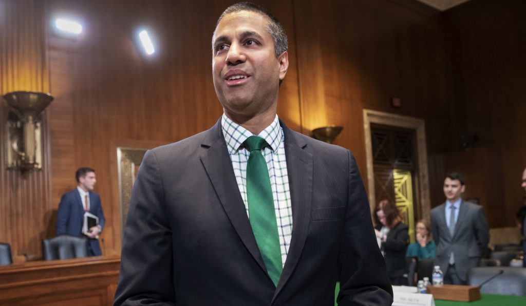 Ajit Pai, chairman Federal Communications Commission, prepares to testify about his budget before a Senate Appropriations subcommittee on Capitol Hill in Washington, Thursday, May 17, 2018. (AP Photo/J. Scott Applewhite)