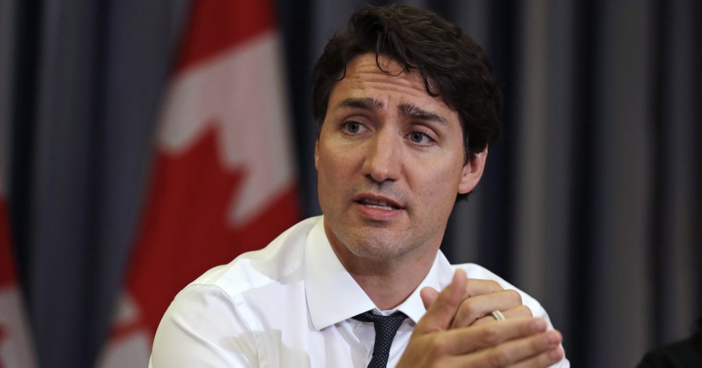 Prime Minister Justin Trudeau gestures during a roundtable discussion with members of the Canadian Technology Accelerator in Cambridge, Mass., Thursday, May 17, 2018. (AP Photo/Charles Krupa)