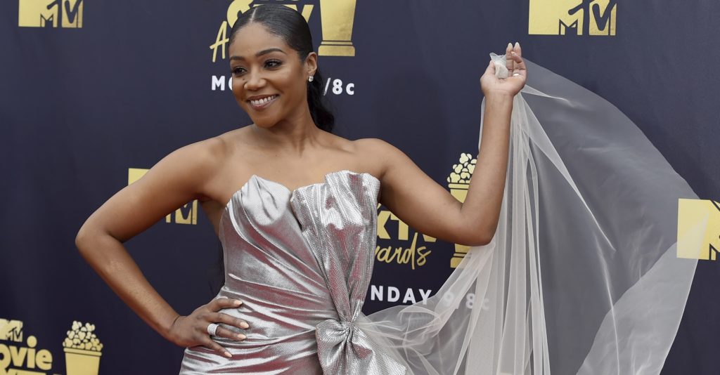Host Tiffany Haddish arrives at the MTV Movie and TV Awards at the Barker Hangar on Saturday, June 16, 2018, in Santa Monica, Calif. (Photo by Jordan Strauss/Invision/AP)