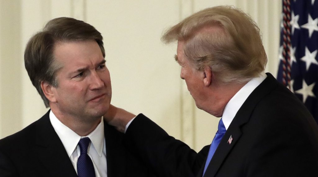 President Donald Trump greets Judge Brett Kavanaugh his Supreme Court nominee, in the East Room of the White House, Monday, July 9, 2018, in Washington. (AP Photo/Evan Vucci)