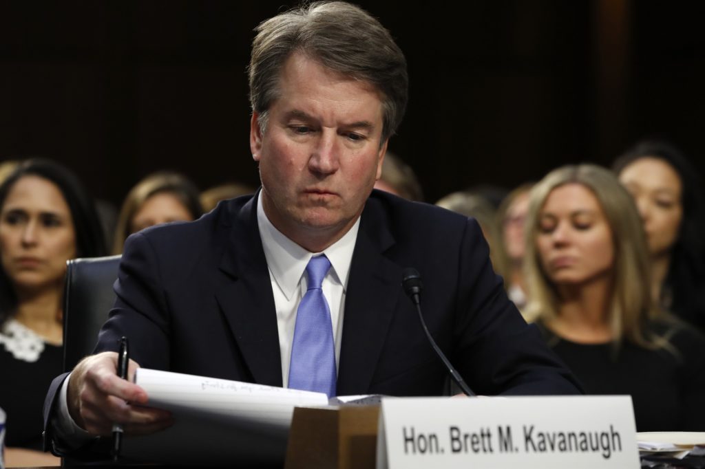 President Donald Trump's Supreme Court nominee, Brett Kavanaugh, looks over his notes during a third round of questioning on the third day of his Senate Judiciary Committee confirmation hearing, Thursday, Sept. 6, 2018, on Capitol Hill in Washington, to replace retired Justice Anthony Kennedy. (AP Photo/Jacquelyn Martin)