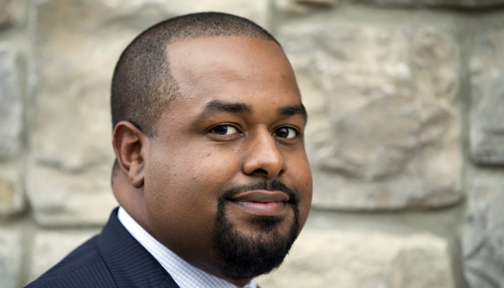Joshua DuBois an informal spiritual adviser to President Barack Obama, poses for a photo in northeast Washington, on Wednesday, Oct. 16, 2013. Obama is not an overtly religious man. He and his family rarely attend church, and he almost never elaborates in public about his own relationship to his Christian faith. But far away from the public eye, his longtime advisers say, the president has carefully nurtured a sense of spirituality that has served as a grounding mechanism during turbulent times, when the obstacles to governing a deeply divided nation seem nearly insurmountable. "Ive certainly seen the president's faith grow in his time in office," said DuBois. (AP Photo/Manuel Balce Ceneta)