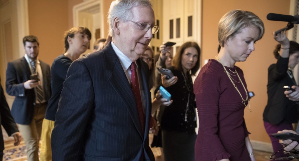 Senate Majority Leader Mitch McConnell, R-Ky., returns to his office after speaking on the Senate floor about Supreme Court nominee Brett Kavanaugh on Capitol Hill in Washington, Monday, Sept. 24, 2018. (AP Photo/J. Scott Applewhite)