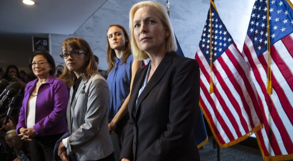 From left, Sen. Mazie Hirono, D-Hawaii, Alexis Goldstein and Sarah Burgess, alumnae of the Holton-Arms School, and Sen. Kirsten Gillibrand, D-N.Y., speak at a news conference in support of Christine Blasey Ford, who is accusing Supreme Court nominee Brett Kavanaugh of a decades-old sexual attack, during a news conference on Capitol Hill in Washington, Thursday, Sept. 20, 2018. Holton Arms is the Maryland all-girls school that Christine Blasey Ford attended in the early 1980s. (AP Photo/J. Scott Applewhite)