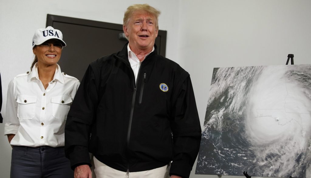 First lady Melania Trump looks on as President Donald Trump reacts to a question about Sen. Elizabeth Warren from a reporter during a briefing with state and local officials on the response to Hurricane Michael, Monday, Oct. 15, 2018, Macon, Ga. (AP Photo/Evan Vucci)