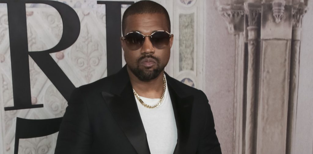 FILE- In this Sept. 7, 2018, file photo Kanye West attends the Ralph Lauren 50th Anniversary Event held at Bethesda Terrace in Central Park during New York Fashion Week in New York. President Donald Trump has panned Saturday Night Live's season premiere but tweeted praise for Kanye West. As the show ended, West took the stage wearing a "Make America Great Again" hat and made an unscripted pro-Trump speech after the credits rolled. (Photo by Brent N. Clarke/Invision/AP, File)