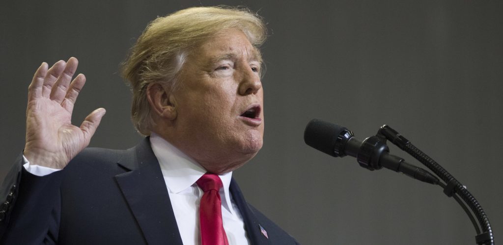 In this Nov. 26, 2018, photo, President Donald Trump speaks at a rally in Biloxi, Miss. Trump said Tuesday, Nov. 27, that he was “very disappointed” that General Motors was closing plants in the United States and warned that the White House was “now looking at cutting all GM subsidies,” including for its electric cars program. (AP Photo/Alex Brandon)