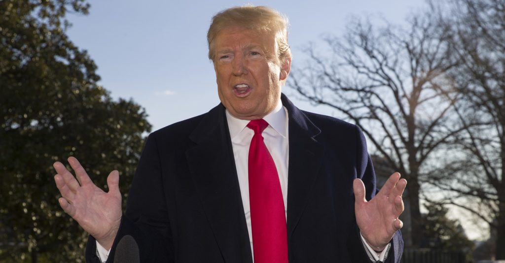 President Donald Trump speaks on the South Lawn of the White House as he walks to Marine One, Sunday, Jan. 6, 2019, in Washington. Trump is en route to Camp David. (AP Photo/Alex Brandon)