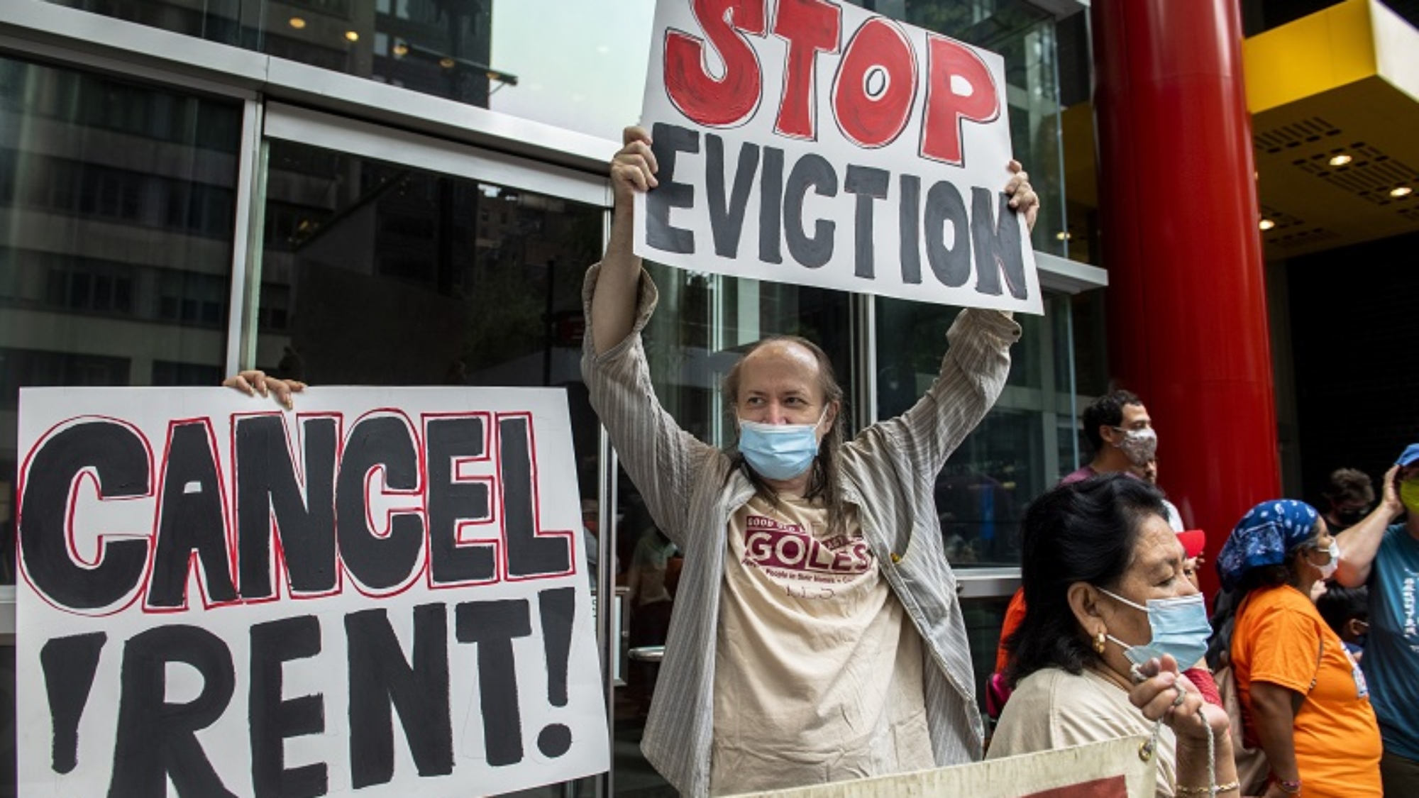 FILE - In this Aug. 4, 2021, file photo, housing advocates protest outside Gov. Andrew Cuomo's office on the eviction moratorium in New York. The Supreme Court is blocking part of New York's moratorium on evictions, put into effect because of the coronavirus pandemic, less than a month before it is supposed to expire anyway. (AP Photo/Brittainy Newman, File)