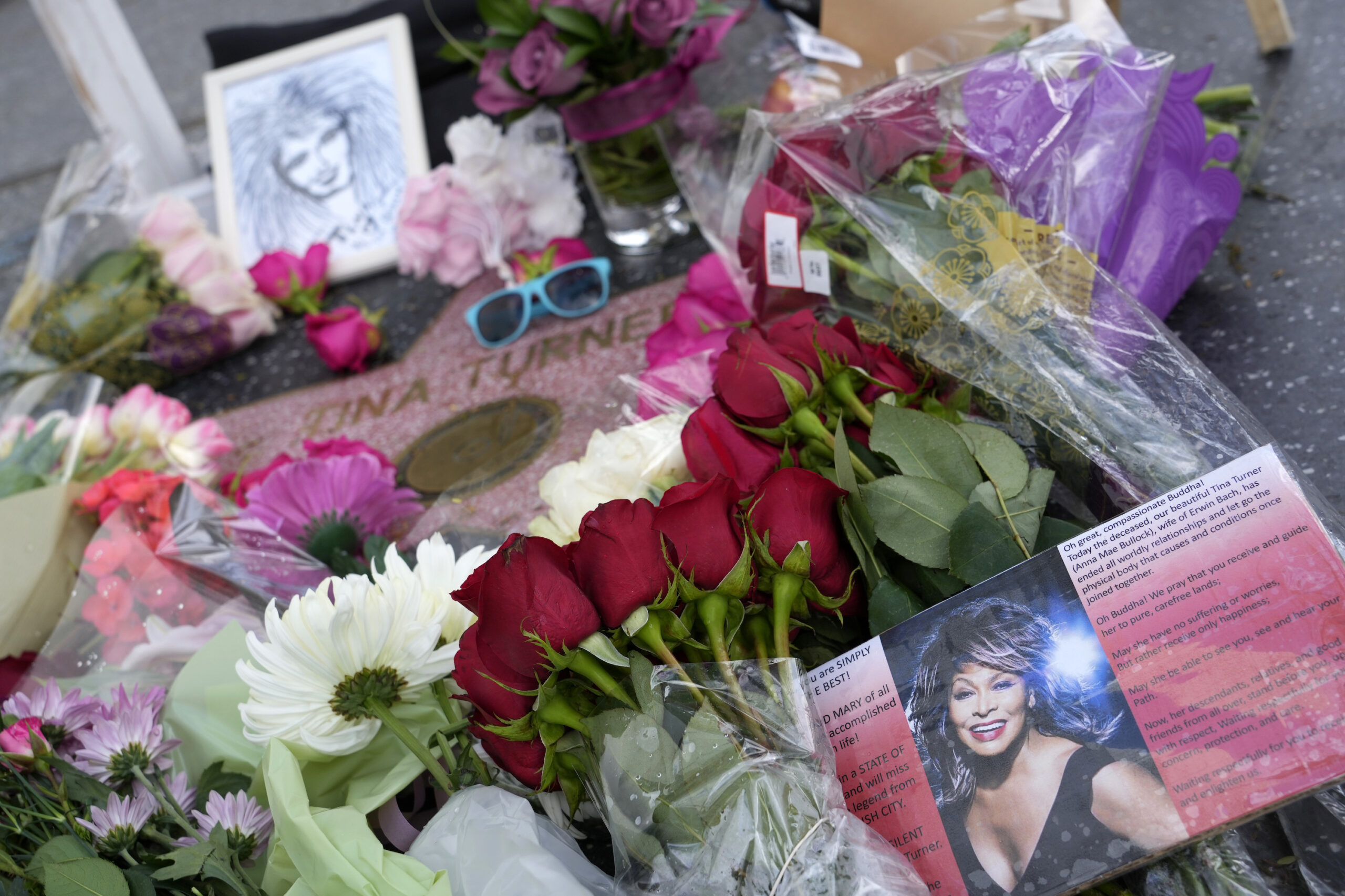 Flowers surround late singer Tina Turner's star on the Hollywood Walk of Fame