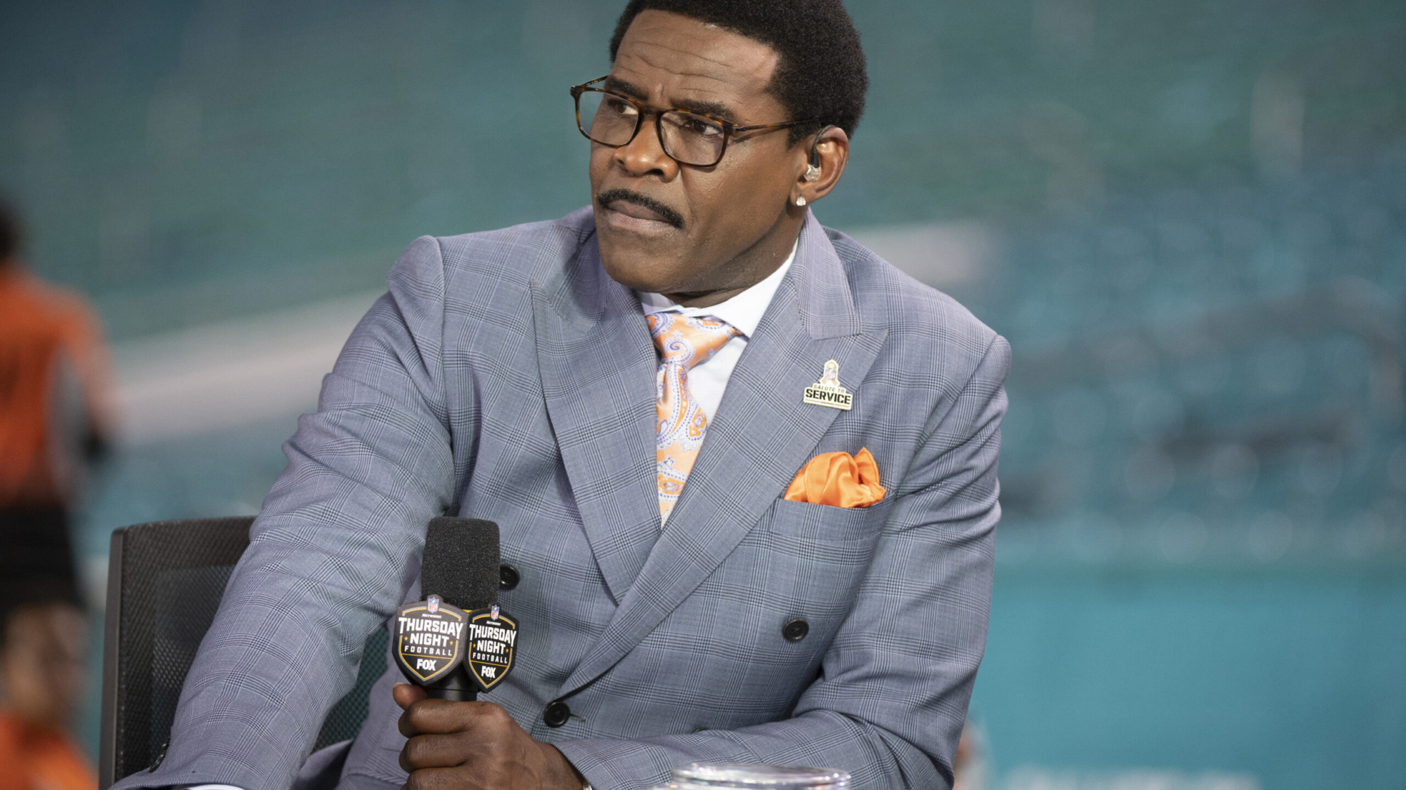 FILE - NFL Network analyst Michael Irvin speaks on air during the NFL Network's NFL GameDay Kickoff broadcast before the start of an NFL football game between the Baltimore Ravens and the Miami Dolphins, Nov. 11, 2021, in Miami Gardens, Fla. Two men who were in a Phoenix hotel lobby the night Hall of Fame wide receiver Michael Irvin was accused of misconduct with an employee said Wednesday, March 8, 2023, they didn't see him do anything wrong and that his brief interaction with the woman appeared friendly. (AP Photo/Doug Murray, File)
